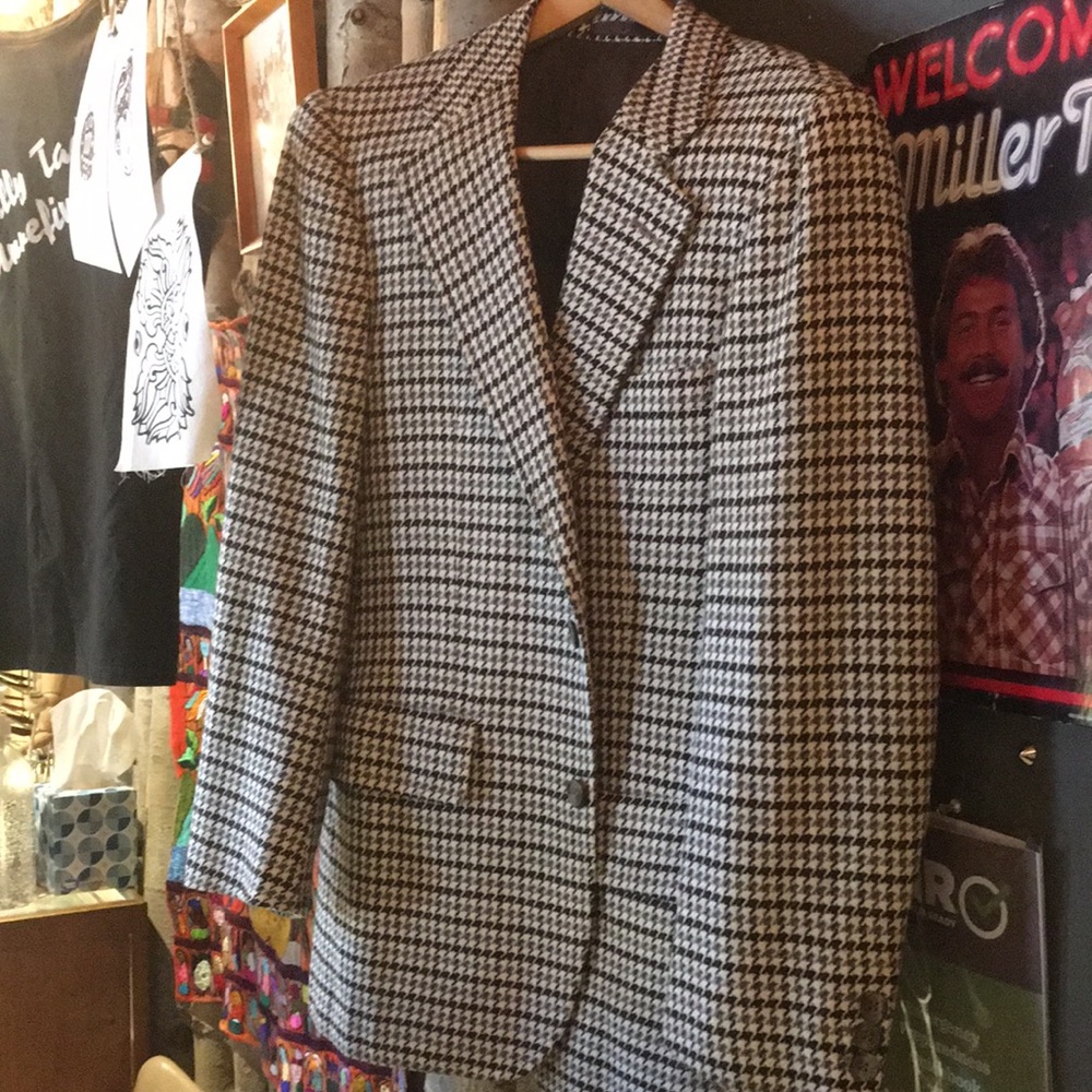 Burberry’s.   Made in England.  Pure cashmere.